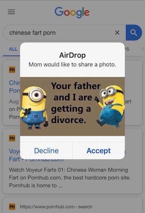 A screenshot of a phone. "AirDrop: Mom would like to share a photo." *Image of a Minions meme saying Your father and I are getting a divorce.* The background behind the AirDrop request is a Google search for "Chinese fart porn"