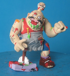 original Pizzaface prototype, with improved paint and a secret second head hidden under his hat