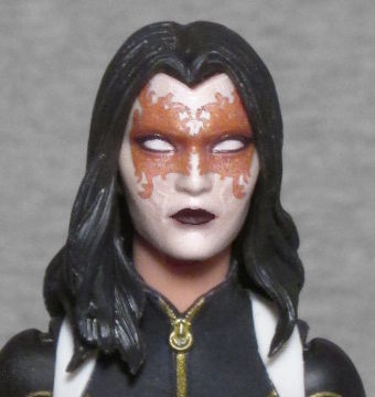 With the mask being nearly white, she now looks like a member of Kiss.